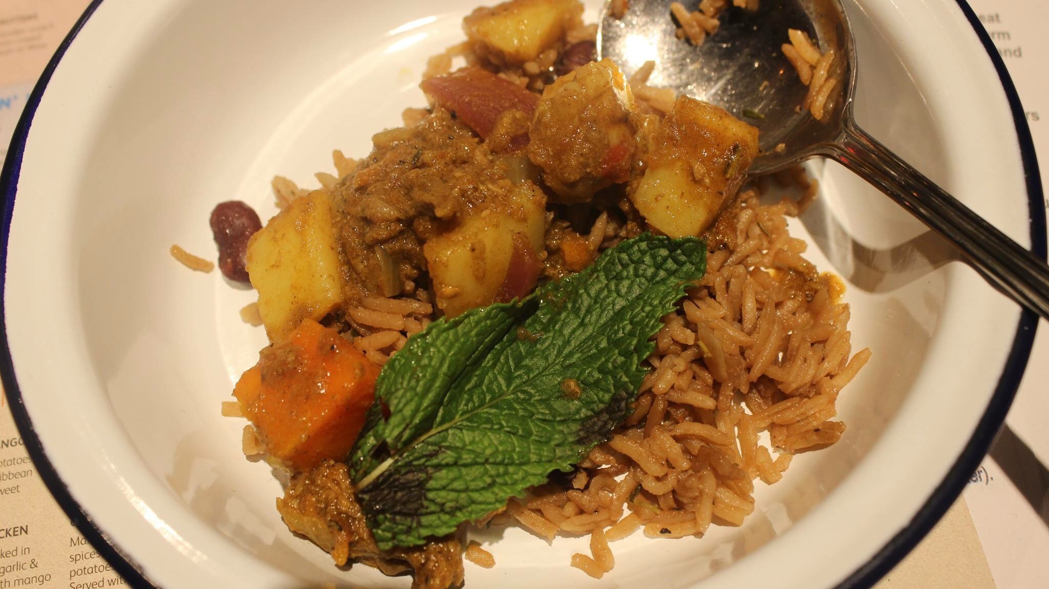 Turtle Bay's Curried Goat with Rice and Peas.