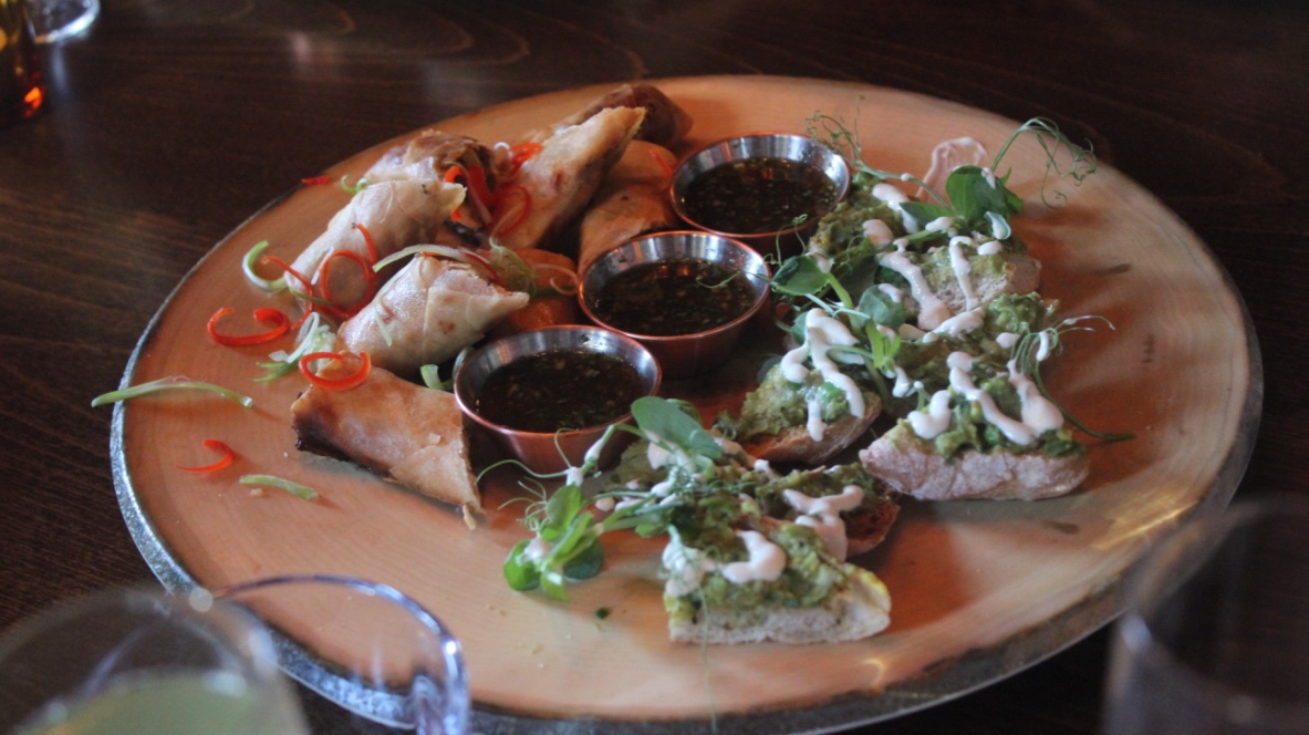 Crispy Duck Spring Rolls on a plate.