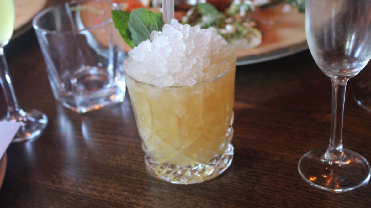 A Rum & Raisin Mai Tai cocktail in a glass.