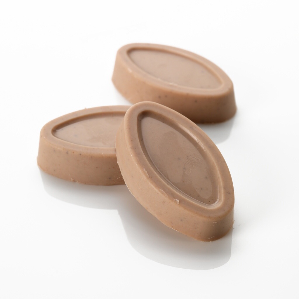 A small oval piece of solid oil.