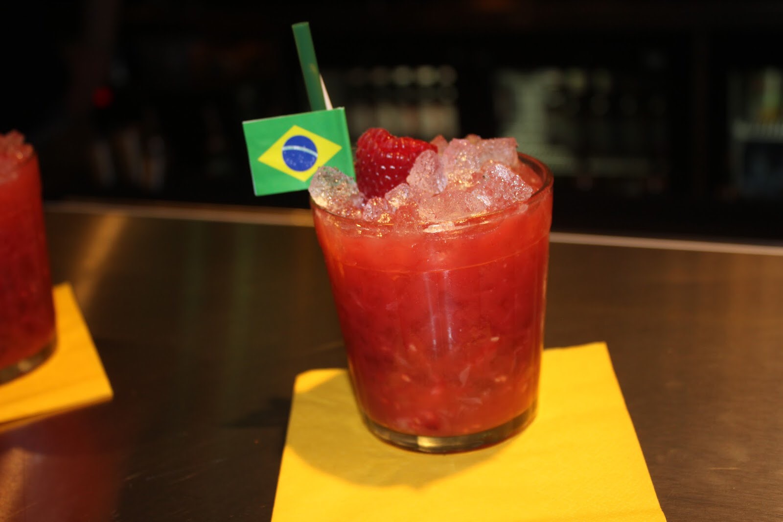 A short glass containing a cocktail.