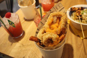 Some deep fried Squid with Sweet Potato Fries.