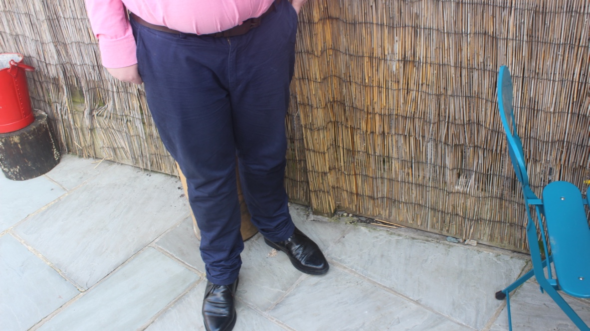 Me wearing a pair of navy coloured chinos.