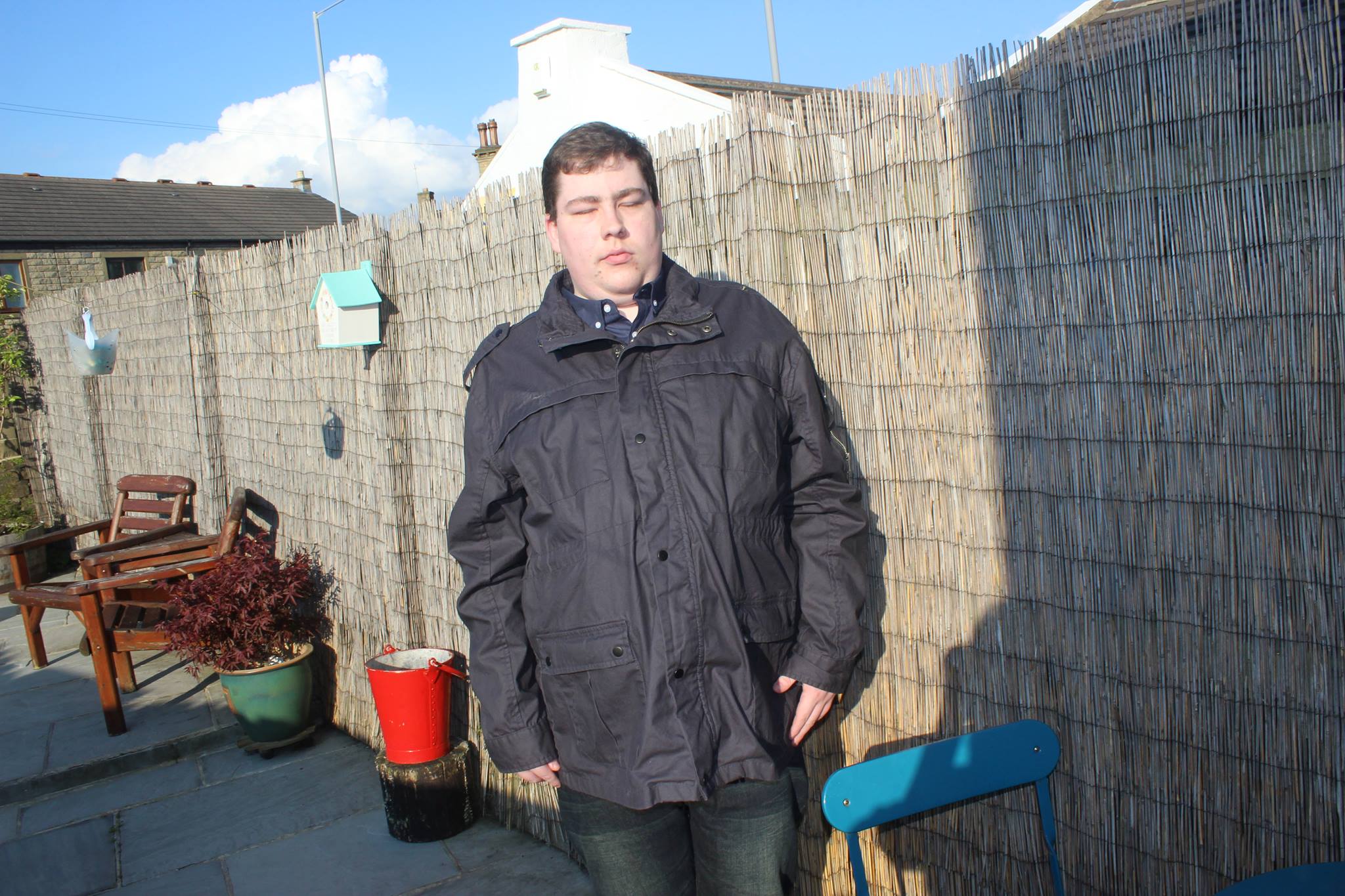 A person wearing a military style jacket.