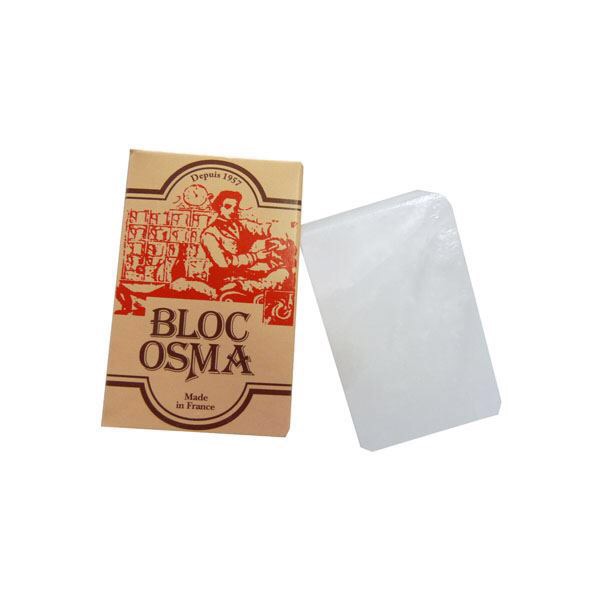 A small brown Osma Labeled box, with a block of shiny silver minerals next to it.