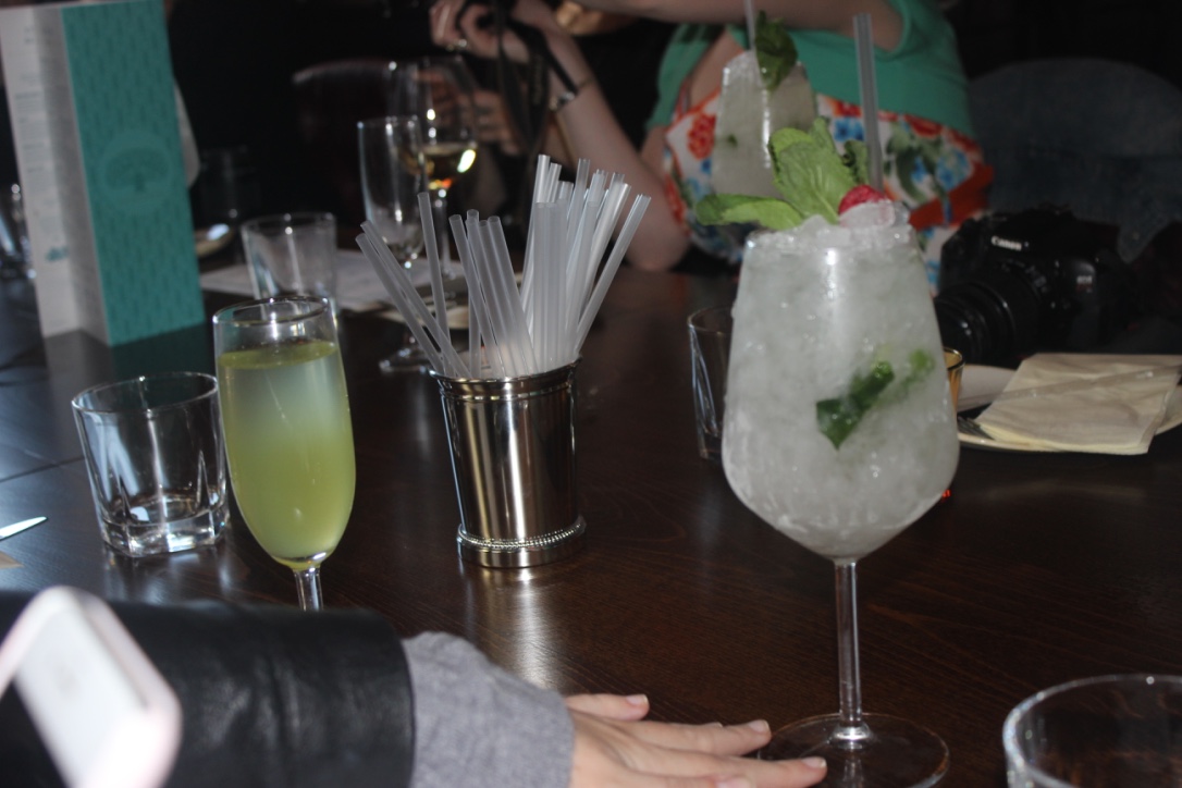 A picture of a Cucumber Cooler cocktail in a large glass.